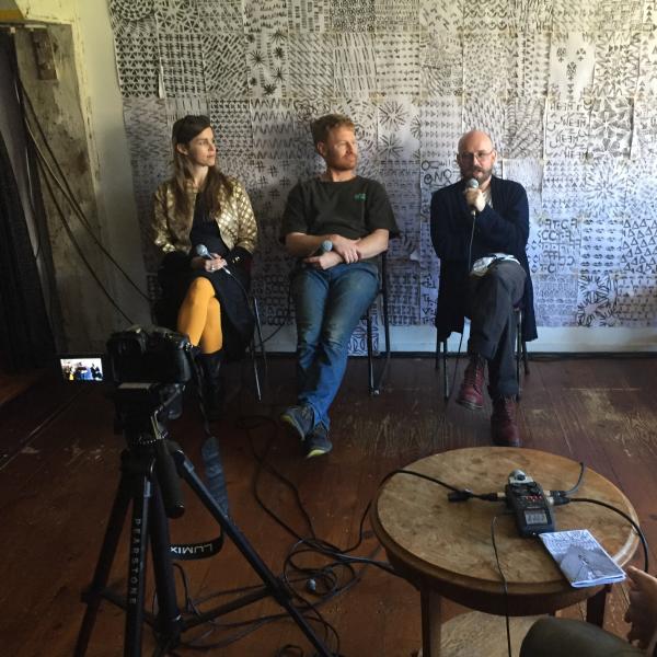 Nell, Dan, and Jonny being interviewed