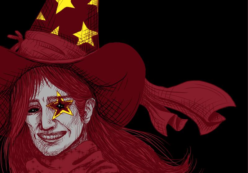 A red wizard person grins with red hair, a red hat with gold star and moon pattern and a red wizard cloak
