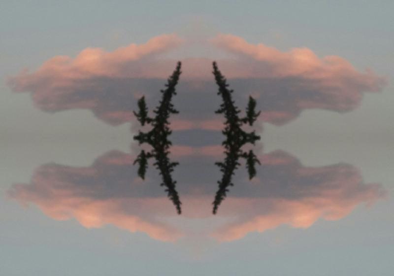 An image with several symetries. There are clouds merging and reflecting, a black abstract shape and a white cross.